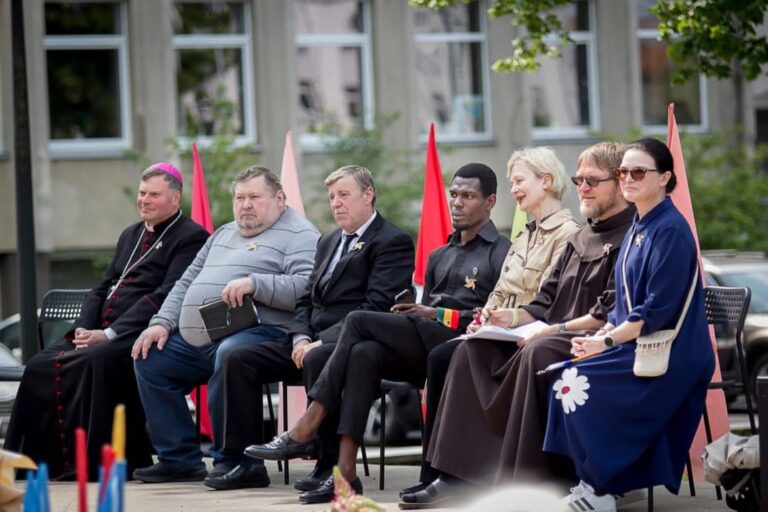 Daniel Osei Afrifa seated with the other speakers and clergy at the Holy Ghost Conference in Šiauliai, Lithuania