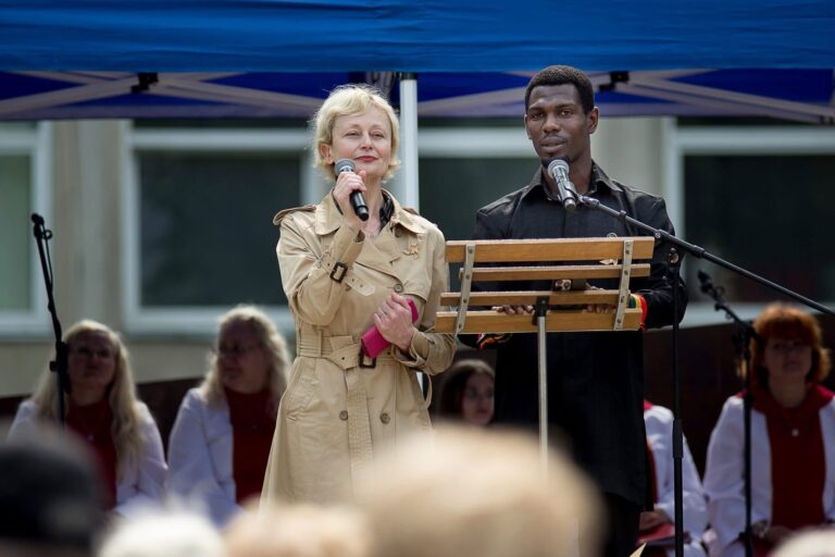 Daniel Osei Afrifa speaking on stage at the Holy Ghost Conference in Šiauliai, Lithuania